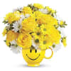 Yellow roses and white daisies in a smiley-face mug