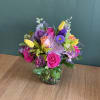 Colorful mixed bouquet in a glass vase