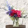 "Hand-crafted by accredited Master Florist Tricia Won (AIFD, EMC, IMF) using premium