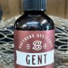 Brown room spray bottle with a clear cap and maroon label