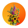 Tall bouquet of sunflowers, yellow daisies, and purple blooms in a vase