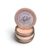 Pink scented candle in a glass jar with a matching lid