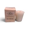 Pink boxed votive candle beside a matching candle cup