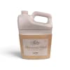 Bottle of Tyler Glamorous Wash laundry detergent in a decorative sleeve