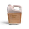 A bottle of Tyler Glamorous Wash laundry detergent with a beige label
