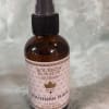 Amber room spray bottle labeled Southern Suede