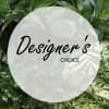 Green foliage with a translucent circle reading "Designer’s Choice"