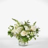 Creamy white roses center the composition of this Hint of Vanilla bouquet