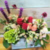 A box of the freshest garden flowers to brighten your day. We