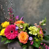 What is in bloom for spring? This arrangement can have what ever