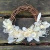 White floral wreath on a twig ring