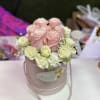PINK ROSES AND FILLER FLOWERS ARRANGED IN A BLOOM BOX 