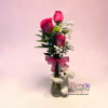 A sweet and charming arrangement featuring fresh pink roses, delicate baby&rsquo;s breath