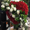 Heart-shaped red carnation arrangement with white roses