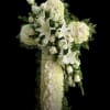 White floral cross arrangement with lilies and roses
