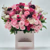 Pink and white rose bouquet in a square gift box