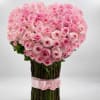 Large bouquet of pink roses tied with a pink ribbon