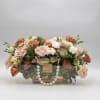 A refined blend of soft blush, ivory, and warm peach tones, this