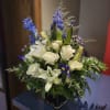 Elevate any space with the enchanting Blue Serenity Bouquet. This exquisite arrangement