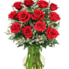 Bouquet of red roses in a clear glass vase