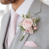 
A soft, romantic accent made with a delicate rose, tiny blooms, and