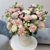 Pink and white mixed bouquet in a cream hat box