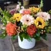 Each arrangement is custom designed, using seasonal, best-of-day blooms. The image shown
