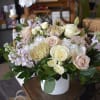 Each arrangement is custom designed, using seasonal, best-of-day blooms. The image shown