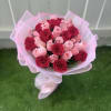 Elegant bouquet featuring 36 stems of red and pink roses, carefully designed