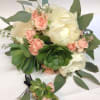 Bouquet of white peonies and pink spray roses with succulents