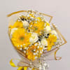 Bouquet of yellow gerbera daisies and white roses with baby's breath