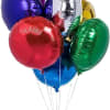 Cluster of metallic balloons in red, blue, green, gold, silver, and purple