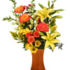 Stylized vase arrangement of the best of the season flowers. Brighten someone's