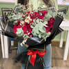 50 Roses. Double the size of standard choice for this product. 