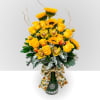 Yellow roses and sunflowers in a green glass vase with a sunflower ribbon