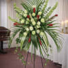 Final Flight Standing Spray is a striking and modern sympathy tribute designed