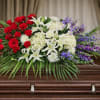 The Unity Casket Spray from FloralFabulous is a powerful and meaningful tribute