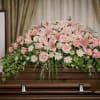 The Softly Resting Casket Spray from FloralFabulous is a delicate and heartfelt