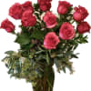 Pink rose bouquet in a clear glass vase