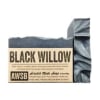 Dark charcoal bar soap with textured top and kraft paper label reading Black Willow.