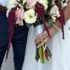 Bride holding a bouquet of pink and white flowers