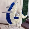 A striking and artistic ocean-inspired floral tribute, designed to honor a loved