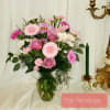 Pink and white mixed bouquet in a glass vase