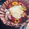 Bouquet of white and red roses with sunflowers and a birthday ribbon