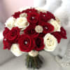 Bouquet of red and white roses with jeweled accents