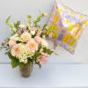 PINK SKY ARRANGEMENT WITH AN "IT'S A GIRL" BALLOON, A SOFT MIXTURE