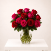 A striking floral arrangement designed with 12 premium roses featuring a romantic