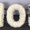 A beautiful and meaningful tribute, this custom sympathy arrangement is designed in