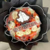 Say &ldquo;You&rsquo;re my forever boo&rdquo; with this Halloween-inspired arrangement of orange and