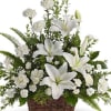 peaceful white lilies in basket made we white carnations, end white lilies